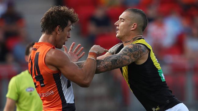 A frustrated Dustin Martin gives Matt de Boer a shove. Picture: Phil Hillyard