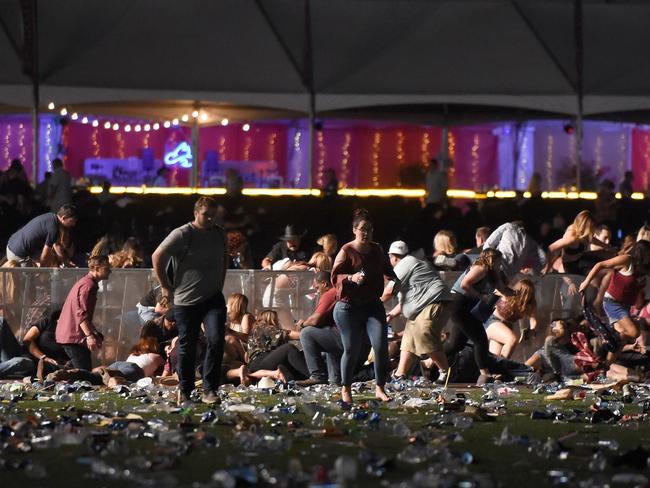 People run from the Route 91 Harvest country music festival amid gun shots. Picture: David Becker/Getty Images/AFP