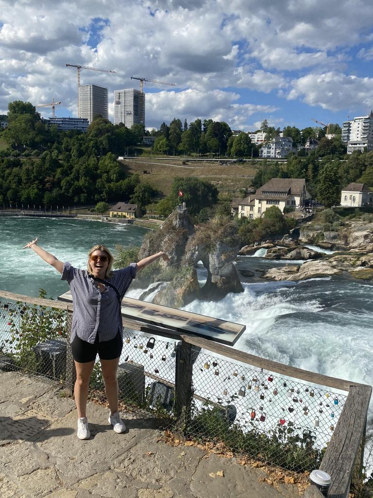 Leah Tindale is travelling the world while also working. Here she is at Rhine Falls in Switzerland. Picture: Supplied