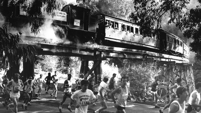 Puffing Billy chugs over the trestle bridge at Belgrave as over 1000 people participated in the Great Train Race in 1988.