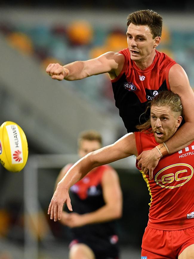 Jake Lever spoils Gold Coast Sun Aaron Young earlier this month. Picture: AAP Image/Dan Peled