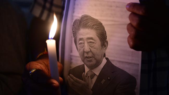 A candlelight vigil to pay tribute to Shinzo Abe in Ahmedabad, India, over the weekend. Picture: AFP