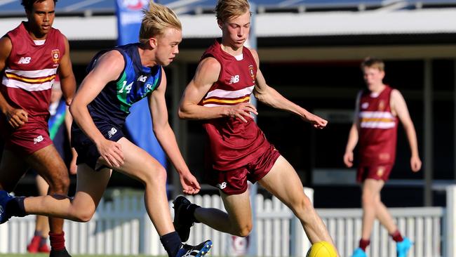 AIC AFL seniors match between Ambr(Maroon top) Friday 10th February 2023 Picture David Clark