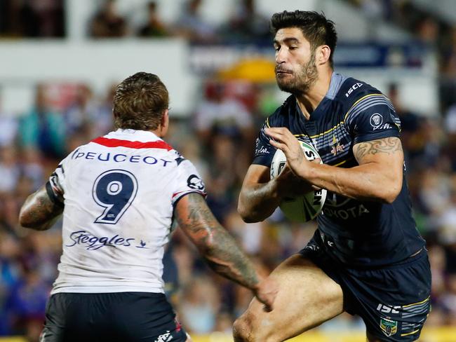 Jake Friend takes on North Queensland’s James Tamou.