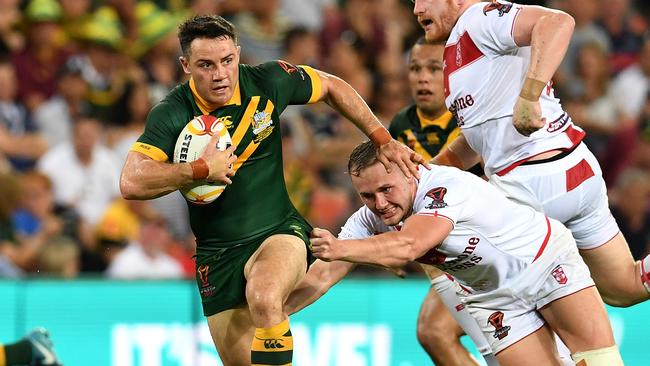 Cooper Cronk of Australia (left) in action.