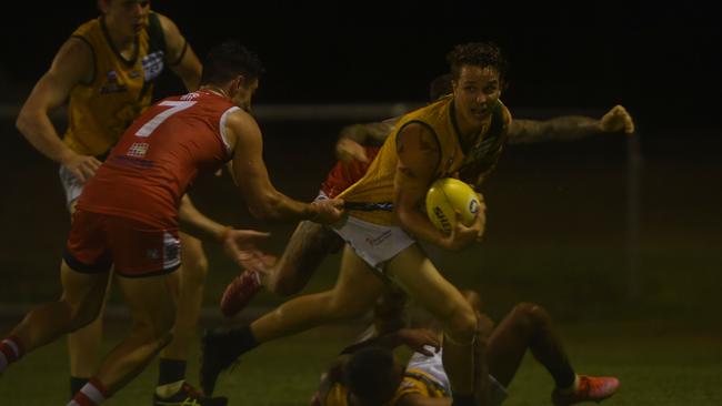 Waratah midfielder Ro Turnbull attempts a tackle on Kieran Parnell. Picture: (A)manda Parkinson