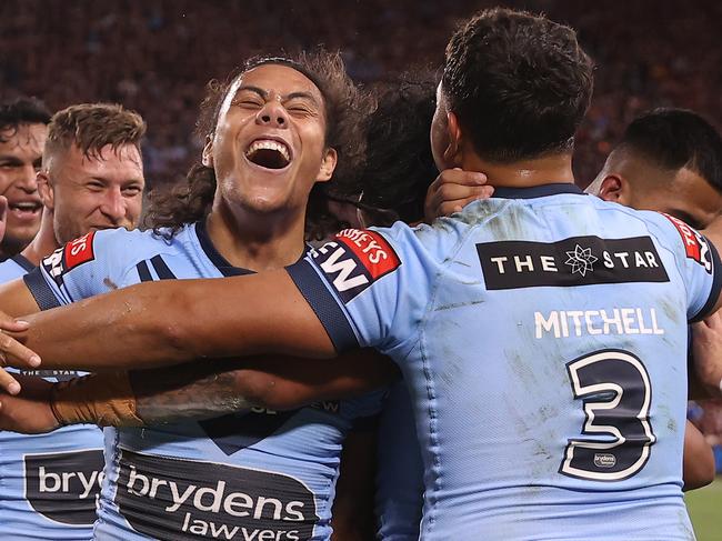 TOWNSVILLE, AUSTRALIA - JUNE 09:  Jerome Luai of the Blues celebrates with team mates after a try scored by Brian To'o of the Blues during game one of the 2021 State of Origin series between the New South Wales Blues and the Queensland Maroons at Queensland Country Bank Stadium on June 09, 2021 in Townsville, Australia. (Photo by Mark Kolbe/Getty Images)