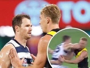 Tom Lynch shoves Patrick Dangerfield.