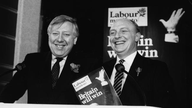 Neil Kinnock, from the soft left, (but pictured right), defeated Roy Hattersley, from the right, in a ballot for leader.