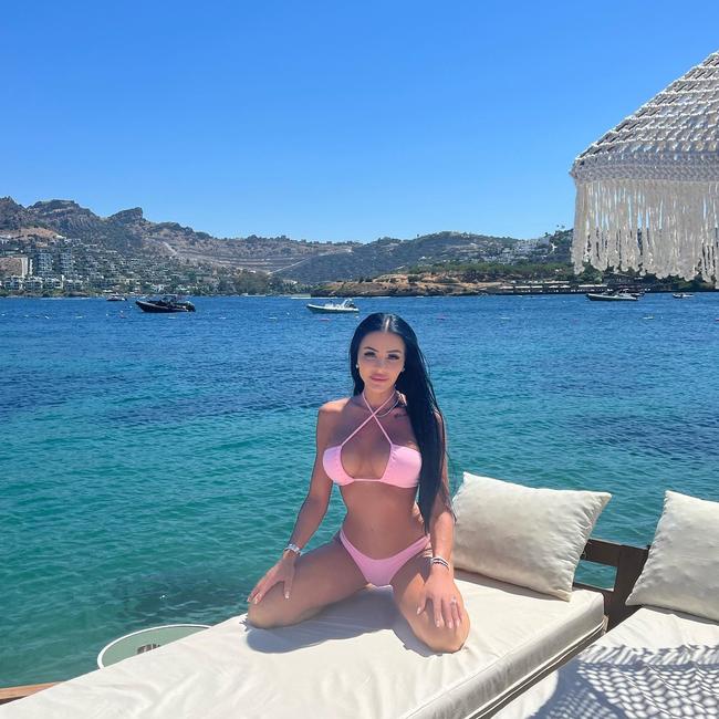 Mel Ter Wisscha posing in a pink bikini on a beach in the resort city of Bodrum in Turkey. Picture: Facebook