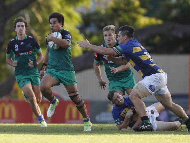 Laloifi Junior (left) of Sunnybank tries to run past Matthew Gordon (right) (AAP Image/Regi Varghese)