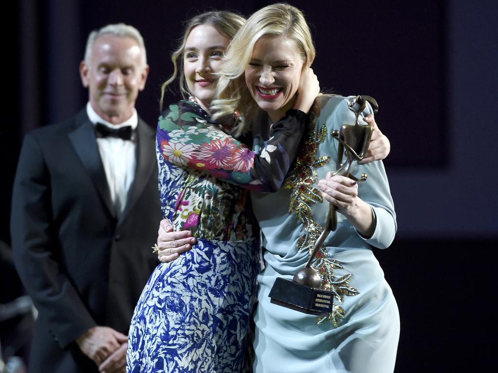 Saoirse Ronan, left, presents the Desert Palm achievement award - actress to Cate Blanchett at the 27th annual Palm Springs International Film Festival Awards Gala on Saturday, Jan. 2, 2016, in Palm Springs, Calif. Picture: Chris Pizzello/Invision/AP