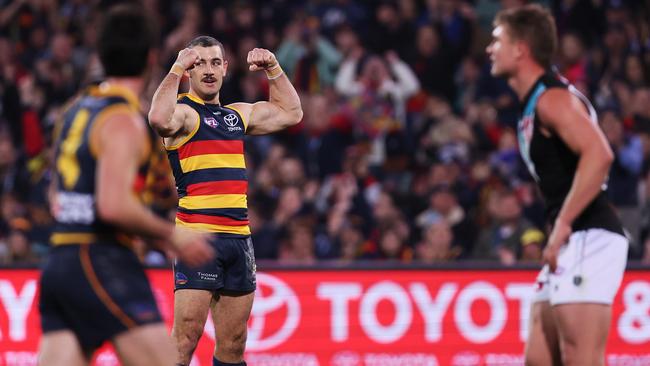 ADELAIDE, AUSTRALIA - JULY 29: Taylor Walker of the Crows celebrates a goal during the 2023 AFL Round 20 match between the Adelaide Crows and the Port Adelaide Power at Adelaide Oval on July 29, 2023 in Adelaide, Australia. (Photo by Sarah Reed/AFL Photos via Getty Images)