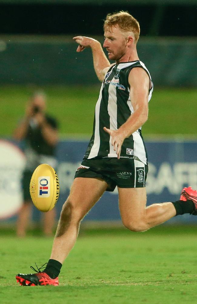 Palmerston captain Eric Guthrie boots the first goal for the Magpies in the Gary Ablett Jr match. Picture: Glenn Campbell