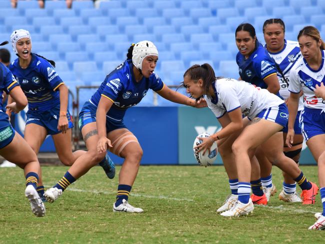 Ryvrr-Lee Alo prepares to tackle Hannah Makira. Picture: Sean Teuma