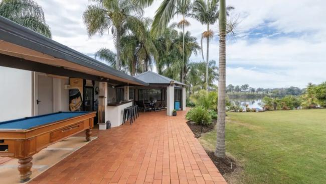 The outdoor entertaining area with views of the Clarence River is a holidayer's delight at this Seelands Airbnb.