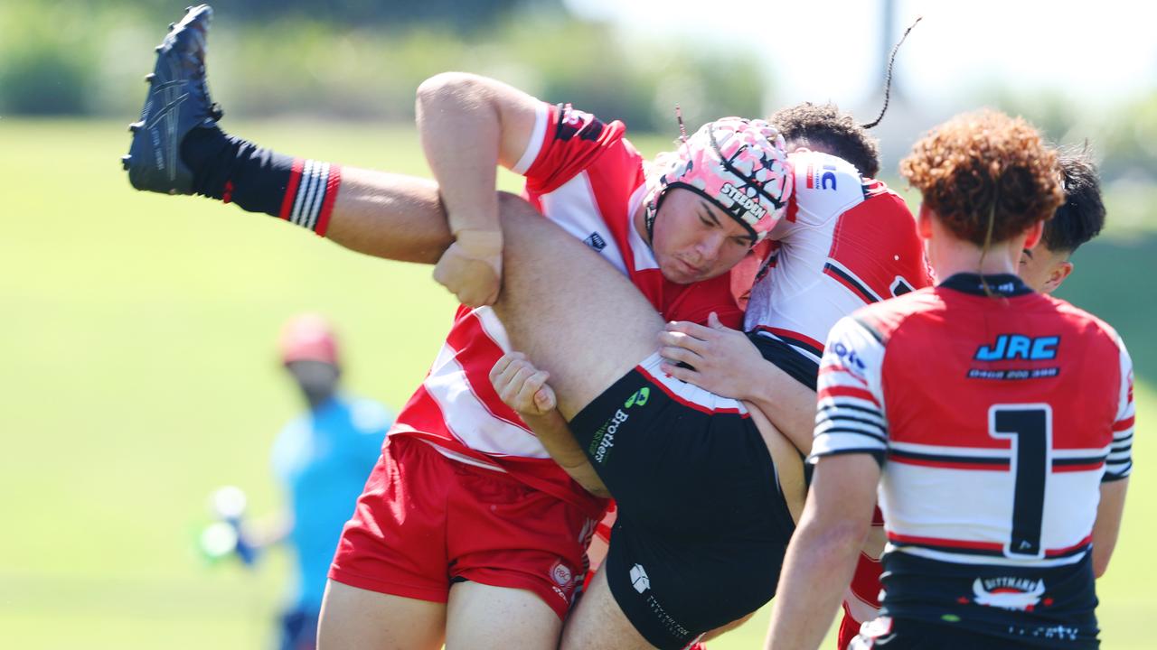 One of the Bilish boys upends a Kirwan SHS player, Picture Lachie Millard