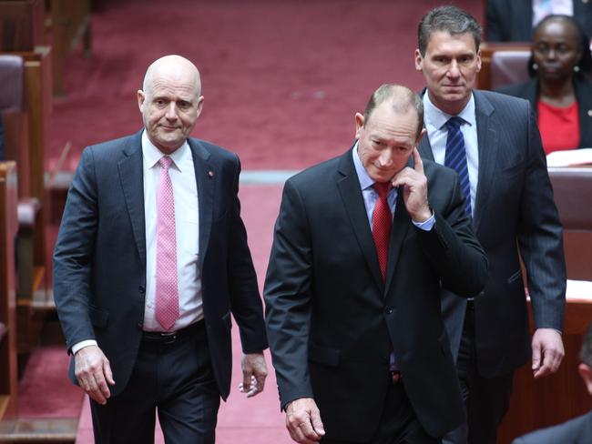 Fraser Anning was escorted into he chamber by senators Cory Benardi and David Leyonhjelm as the One Nation Leader Pauline Hanson was a no show for the ceremony for her new senator. Picture: Gary Ramage