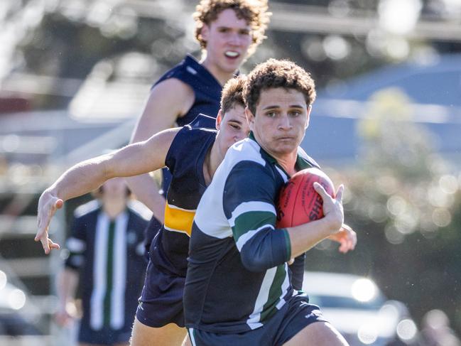 Tedcastle bursts clear playing for St Patrick’s College. Picture: Jake Nowakowski.