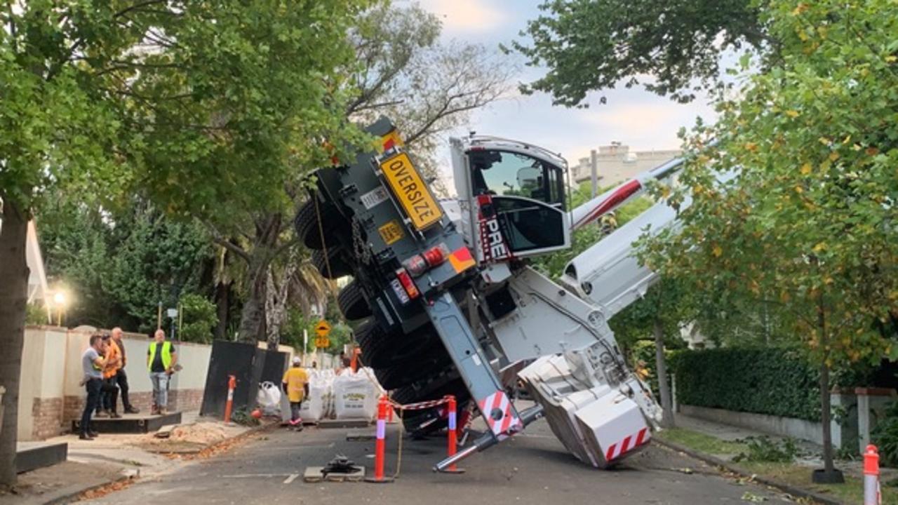 The crane which toppled over onto a nearby apartment block while renovating the $40m-plus South Yarra mansion.