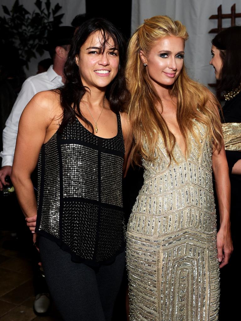 Michelle Rodriguez and Paris Hilton attend the Warner Music Group annual Grammy celebration. Picture: Getty