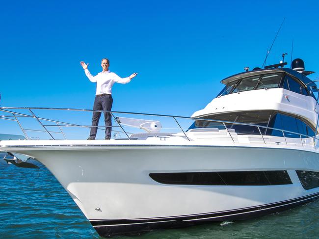 Riviera boss Rodney Longhurst with the company's new $3.2 million 64 Sports Motor Yacht.  For business story on export success of Riviera.Picture: NIGEL HALLETT