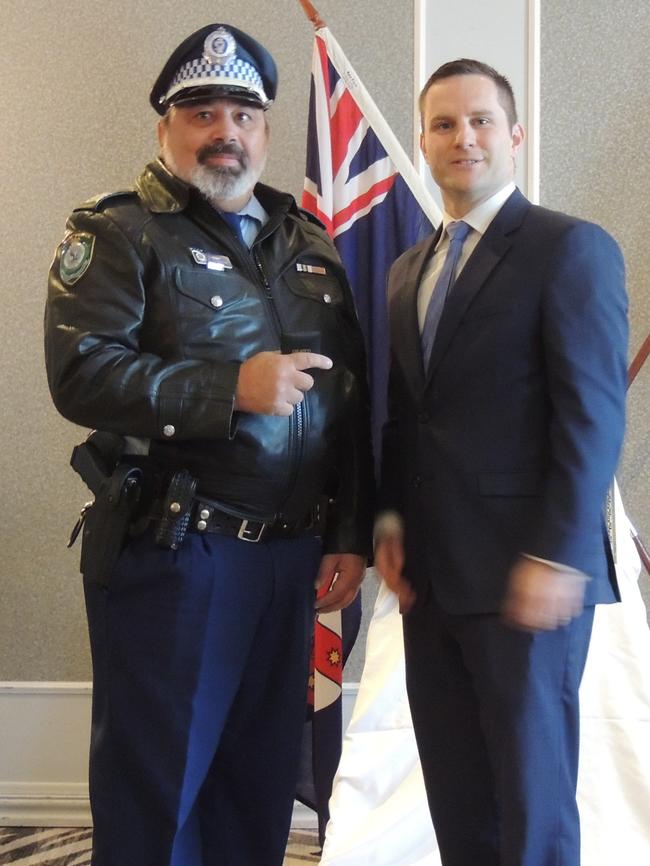 Sgt Guiseppe Mammone receives his National Medal 25 year clasp from Mitchell Federal Liberal MP Alex Hawke