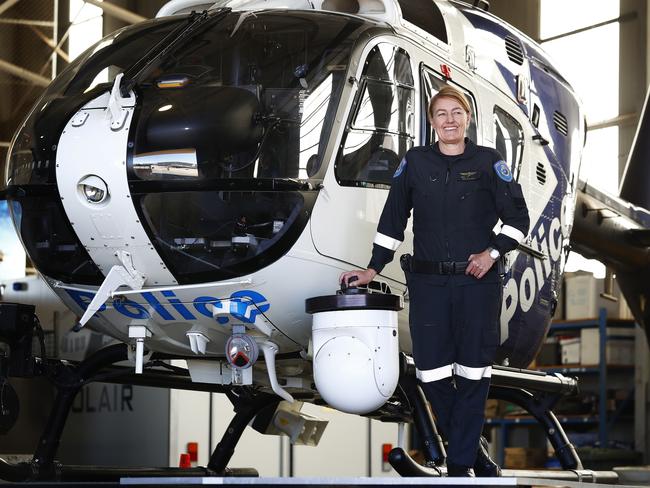 Salli-Ann Ward with one of the police helicopters. Picture: Sam Ruttyn