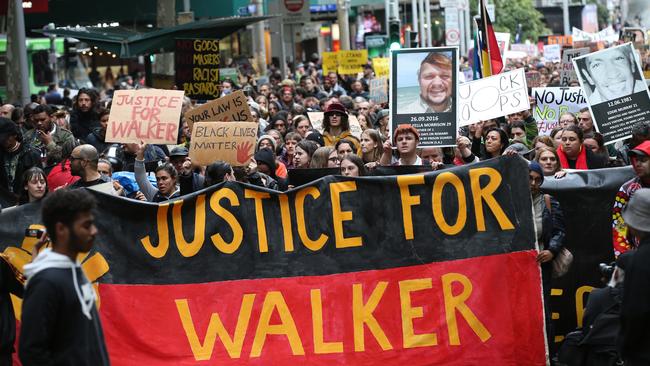 Aboriginal and Torres Strait Islanders communities and allies march during a protest in Melbourne on November 13, 2019 after Walker’s death. Picture: AAP/David Crosling