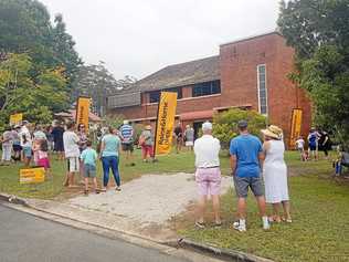 SUNDAY SERVICE: The auction of the former Catholic school now a residential property at 3 Church St, Pomona, drew a good crowd and bidding.