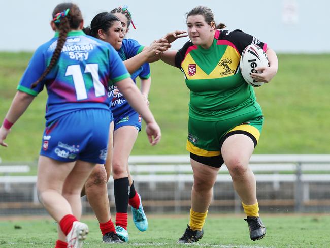 Charlee Croucher puts in a strong run in the Far North Queensland Rugby League (FNQRL) Under 17 girl's grand final match between the Mareeba Gladiators and the Innisfail Leprechauns, held at Barlow Park. Picture: Brendan Radke