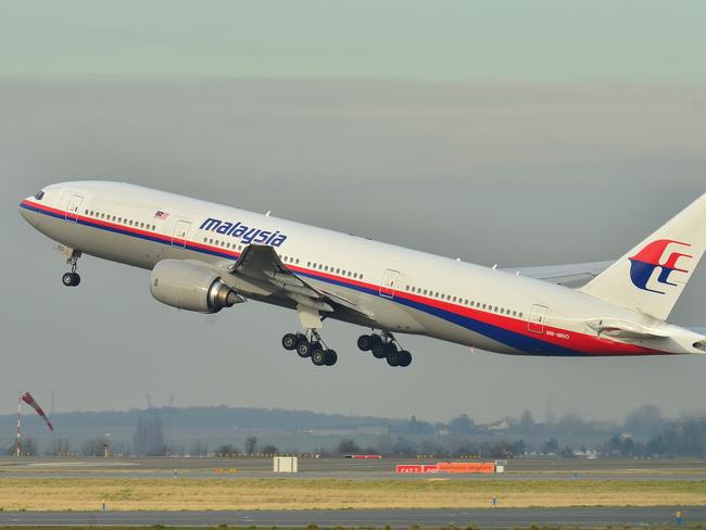 MH370 - Malaysia Airlines Boeing 777-200ER (9M-MRO) taking off at Roissy-Charles de Gaulle Airport (LFPG) in France.