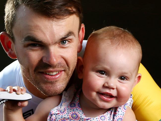 CYCLING - Tour Down Under - National Road Champion and local hero Jack Bobridge with his 16 month old daughter Amellie. Photo Sarah Reed.