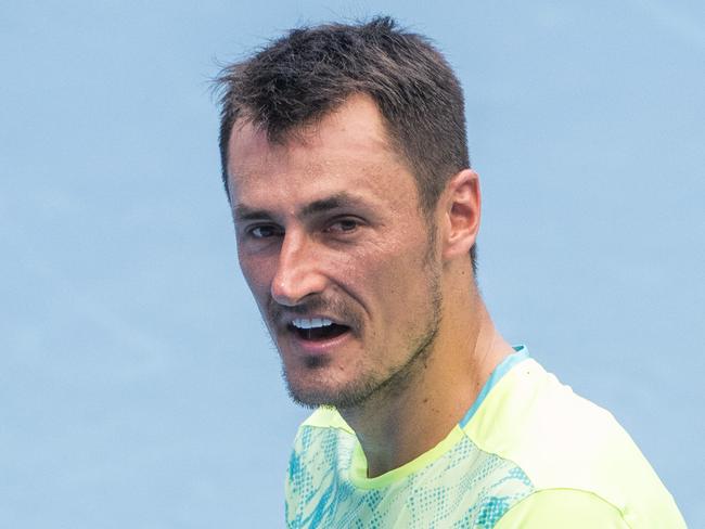 Australian Open warm up sessions.Bernard Tomic trains on one MelbourneÃ¢â¬â¢s hottest before the start of the tournament. Picture: Tony Gough