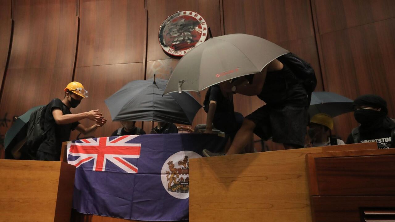 Hong Kong govt evacuated as protesters storm legislature