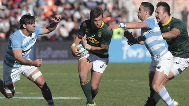 Kurtley Beale will be looking to keep Handre Pollard  in check. Picture: AP.