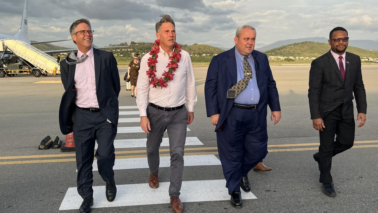 Australian High Commissioner Jonathan Philp, Richard Marles, PNG foreign minister Justin Tkatchenko, and his first secretary Tokana Hasavi Jnr, pictured at Jacksons International Airport in Port Moresby, Papua New Guinea, last year. Picture: Supplied
