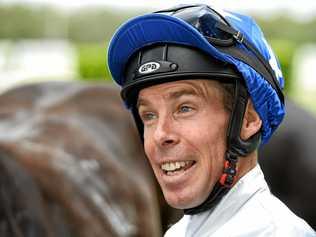 JOCKEY'S JOY: Ronnie Stewart displays his delight winning aboard Brocky in the Lyndons 2yo Maiden Plate at Ipswich racetrack last Friday. Picture: Rob Williams