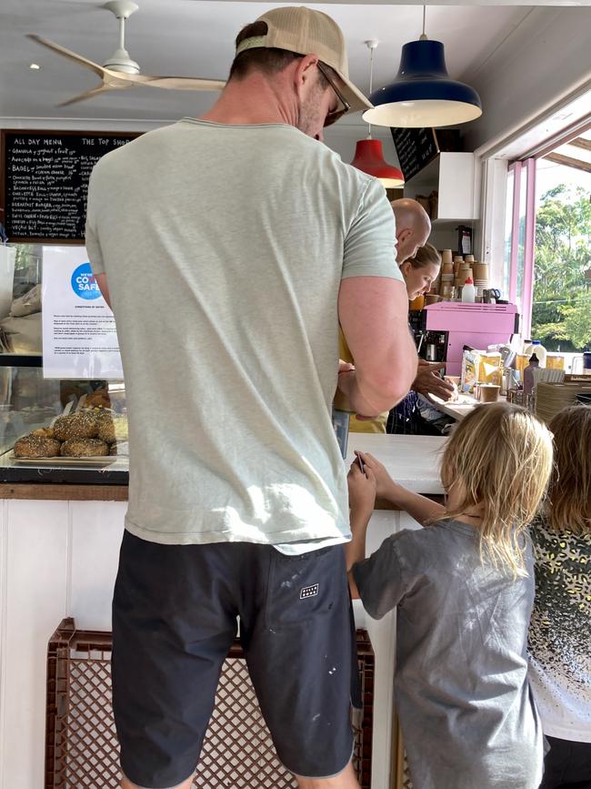 The actor queuing for breakfast at Top Shop cafe.