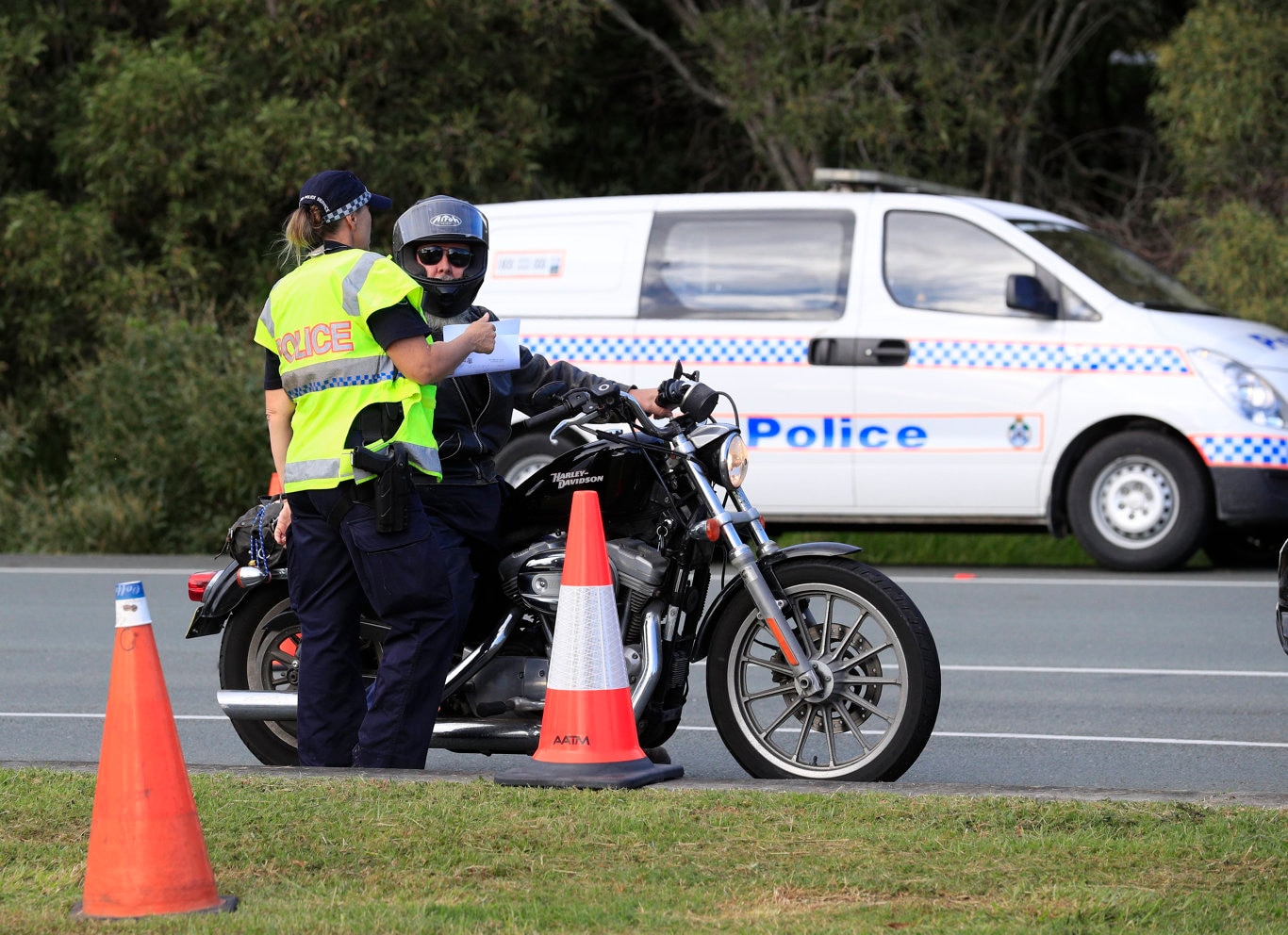 Queensland Police set up a road block due to the Corona Virus at the NSW / Queensland Border on the old Pacific Highway at Coolangatta. Photo: Scott Powick Newscorp