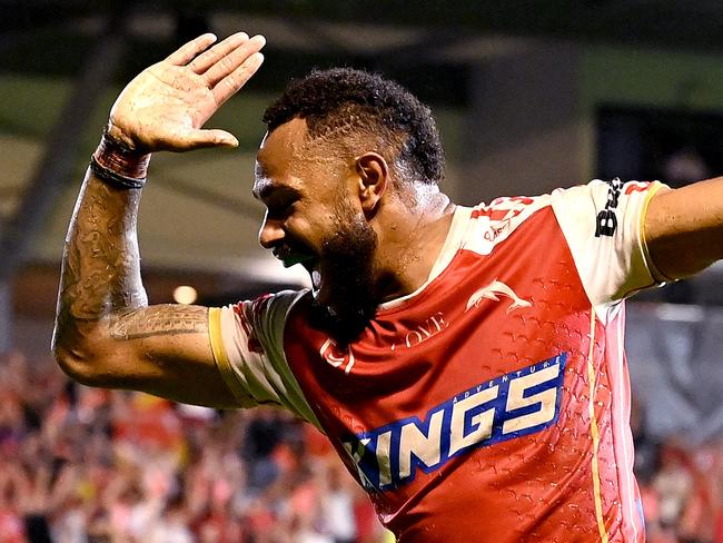 BRISBANE, AUSTRALIA - MARCH 11: Hamiso Tabuai-Fidow of the Dolphins celebrates scoring a try during the round two NRL match between the Dolphins and the Canberra Raiders at Kayo Stadium on March 11, 2023 in Brisbane, Australia. (Photo by Bradley Kanaris/Getty Images)