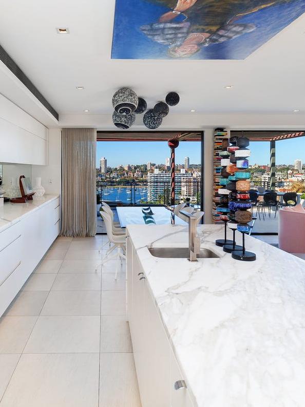 … has moved up in her Potts Point apartment block.