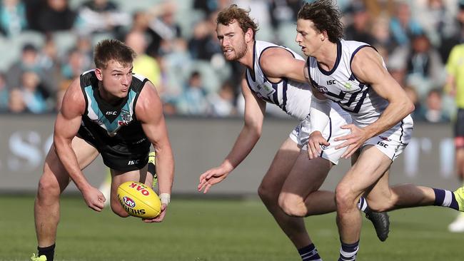 Ollie Wines on his way to 15 contested possessions against the Dockers. Picture: Sarah Reed.