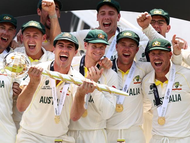LONDON, ENGLAND - JUNE 11: Pat Cummins of Australia lifts the ICC World Test Championship Mace on day five of the ICC World Test Championship Final between Australia and India at The Oval on June 11, 2023 in London, England. (Photo by Ryan Pierse/Getty Images)