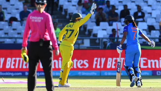 Healy knew she’d caught Kaur short of her crease in the biggest moment of the match. Picture: Rodger Bosch / AFP