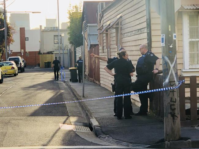 Police tape off the scene after reports of a shooting in Leeds St, Richmond. Picture: Alex Coppel