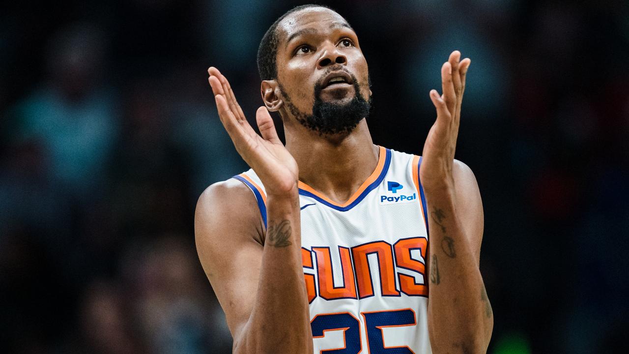 CHARLOTTE, NORTH CAROLINA - MARCH 01: Kevin Durant #35 of the Phoenix Suns reacts in the fourth quarter during their game against the Charlotte Hornets at Spectrum Center on March 01, 2023 in Charlotte, North Carolina. NOTE TO USER: User expressly acknowledges and agrees that, by downloading and or using this photograph, User is consenting to the terms and conditions of the Getty Images License Agreement. (Photo by Jacob Kupferman/Getty Images)