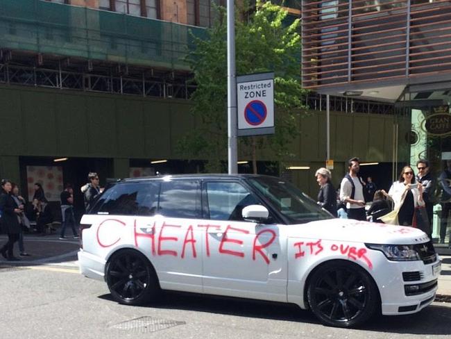 A virtually brand new $150,000 Range Rover parked overnight Wednesday in London’s Knightsbridge right outside Harrod’s, daubed with the words “CHEATER. It’s over. I hope she was worth it.” The prestige car was registered only in March, with the spurned lover of its driver taking to the flash wheels with red spray paint to publicly vent her pain. It’s driver, sporting sunnies and a white t-shirt, was later seen jumping into the SUV, which by then had also been given a ticket by a parking inspector.