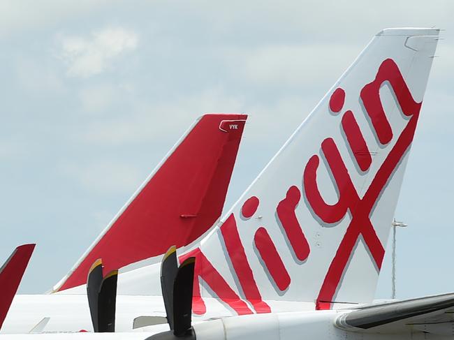 Generic photographs at Townsville Airport. A Virgin Airlines plane and a Qantas plane. Picture: Evan Morgan