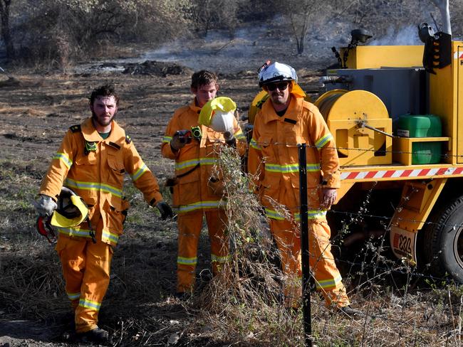 Scrub fire at Julago, just south of Townsville, causes delays to traffic on Bruce Highway. Rural Fire fighters from Nome. Picture: Evan Morgan